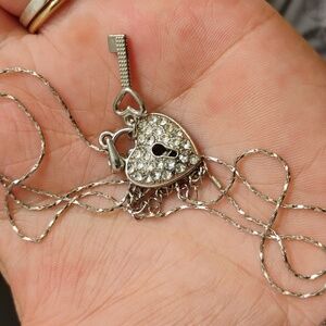 Silver tone heart lock and key necklace